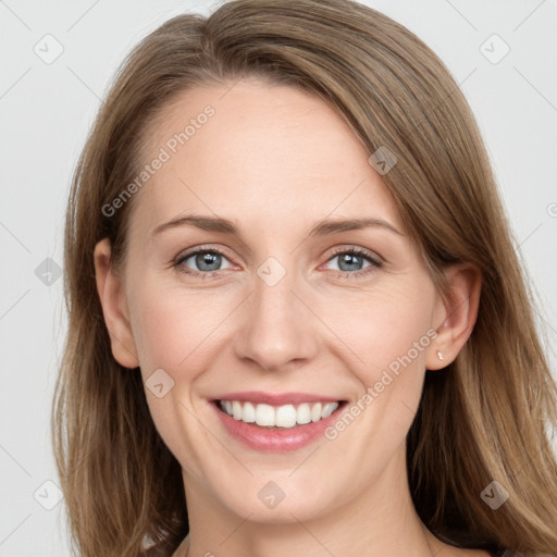 Joyful white young-adult female with long  brown hair and grey eyes