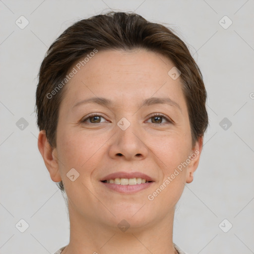 Joyful white young-adult female with short  brown hair and grey eyes