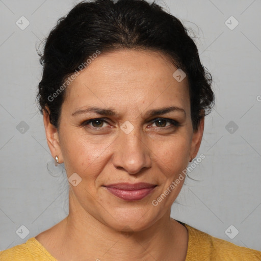 Joyful white adult female with short  brown hair and brown eyes