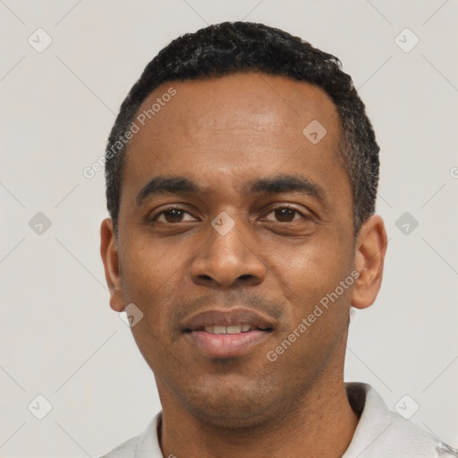 Neutral black young-adult male with short  black hair and brown eyes