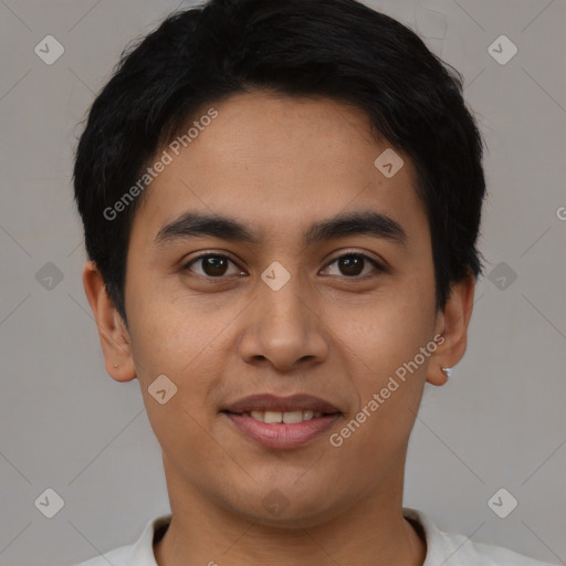 Joyful asian young-adult male with short  black hair and brown eyes