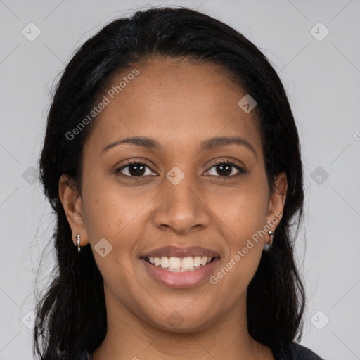 Joyful latino young-adult female with long  black hair and brown eyes