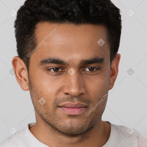Neutral white young-adult male with short  black hair and brown eyes