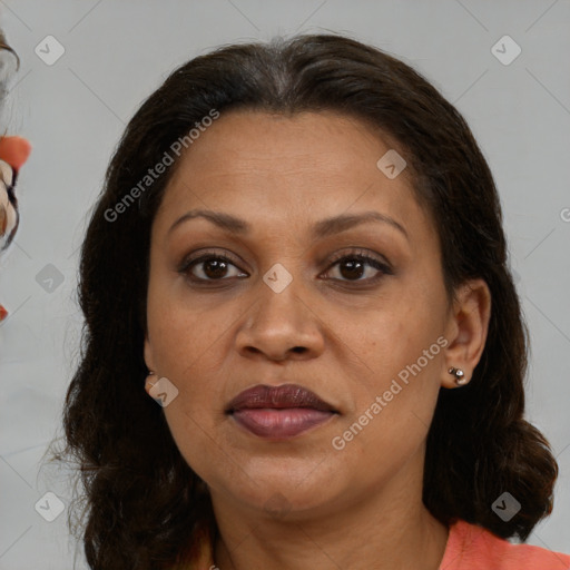 Joyful white adult female with medium  brown hair and brown eyes