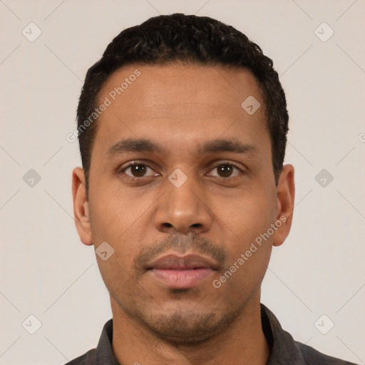 Neutral latino young-adult male with short  black hair and brown eyes