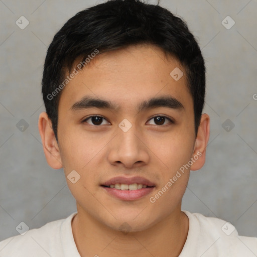 Joyful asian young-adult male with short  black hair and brown eyes