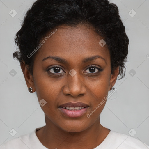 Joyful black young-adult female with short  black hair and brown eyes