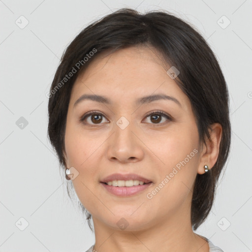 Joyful white young-adult female with medium  brown hair and brown eyes