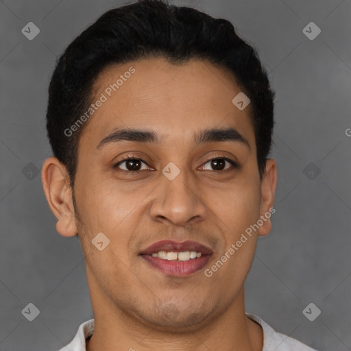 Joyful latino young-adult male with short  brown hair and brown eyes