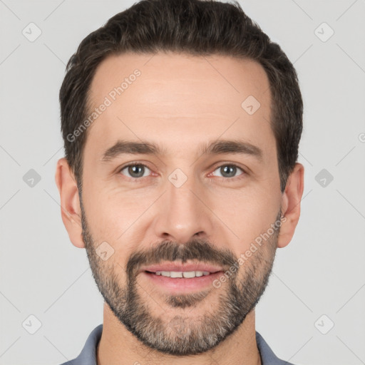 Joyful white young-adult male with short  black hair and brown eyes