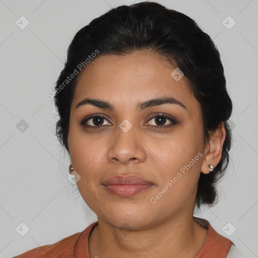 Joyful latino young-adult female with medium  black hair and brown eyes