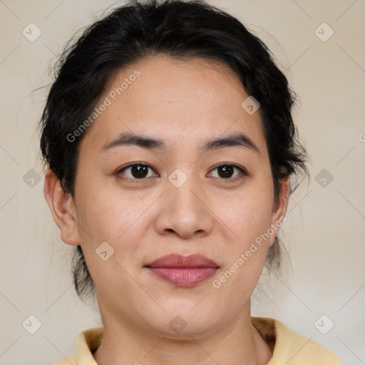 Joyful asian young-adult female with medium  brown hair and brown eyes