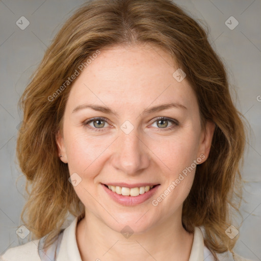 Joyful white young-adult female with medium  brown hair and blue eyes