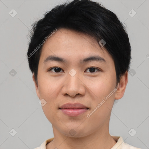 Joyful asian young-adult male with short  brown hair and brown eyes