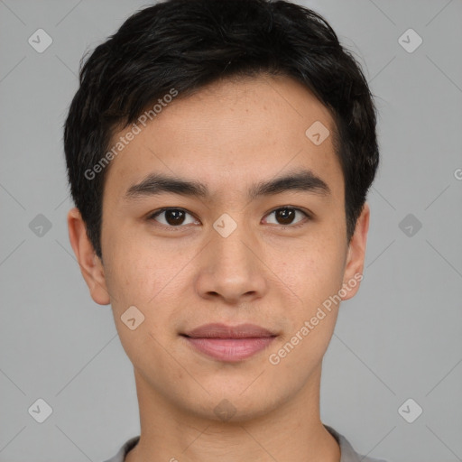 Joyful asian young-adult male with short  brown hair and brown eyes