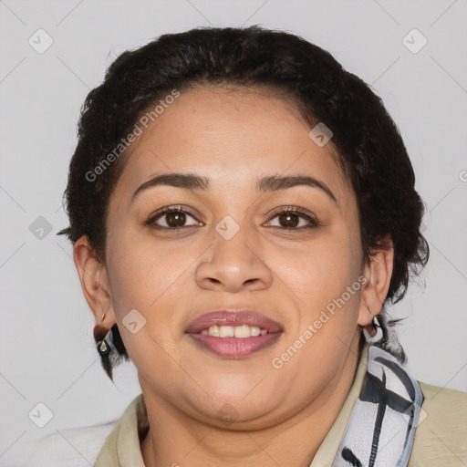 Joyful latino adult female with medium  brown hair and brown eyes