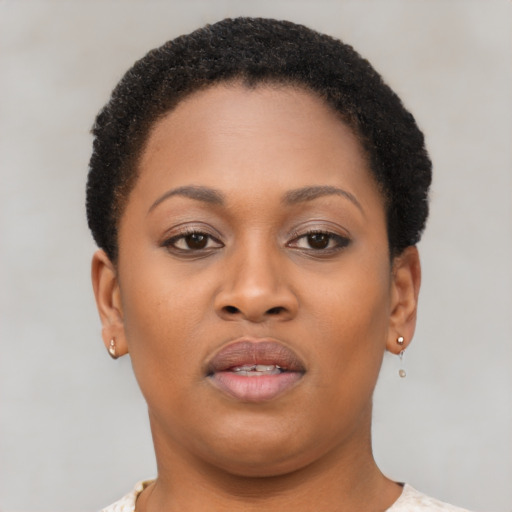 Neutral black young-adult female with short  brown hair and brown eyes