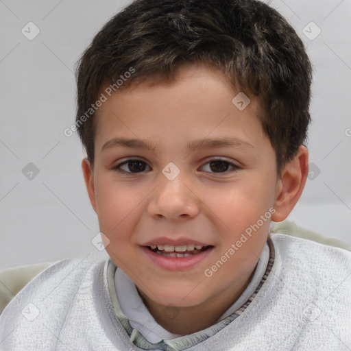 Joyful white child male with short  brown hair and brown eyes