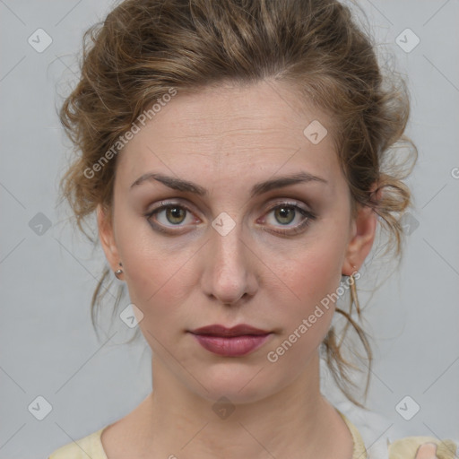 Joyful white young-adult female with medium  brown hair and green eyes