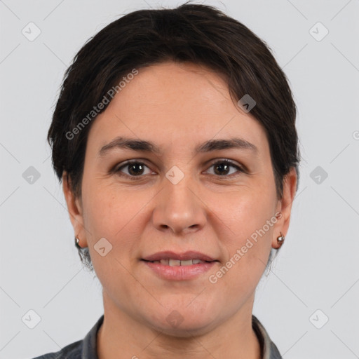 Joyful white adult female with short  brown hair and brown eyes