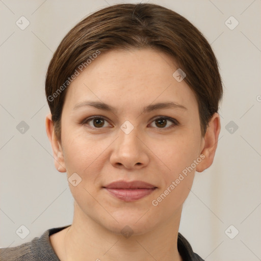 Joyful white young-adult female with short  brown hair and brown eyes