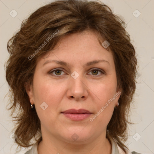 Joyful white young-adult female with medium  brown hair and green eyes