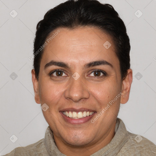 Joyful white adult female with short  brown hair and brown eyes