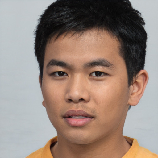 Neutral asian young-adult male with short  black hair and brown eyes