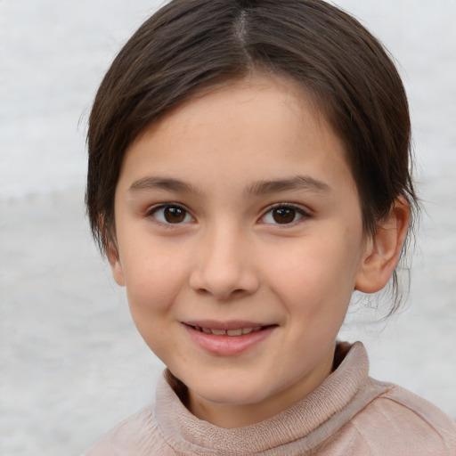 Joyful white child female with short  brown hair and brown eyes