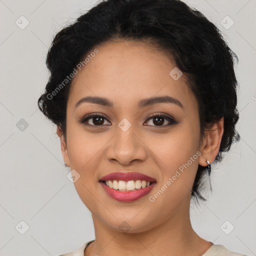 Joyful latino young-adult female with short  brown hair and brown eyes