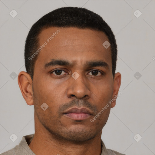 Neutral latino young-adult male with short  brown hair and brown eyes