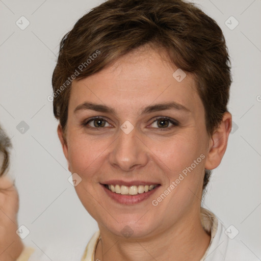 Joyful white young-adult female with short  brown hair and brown eyes