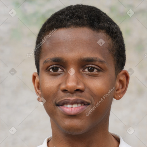 Joyful black young-adult male with short  brown hair and brown eyes