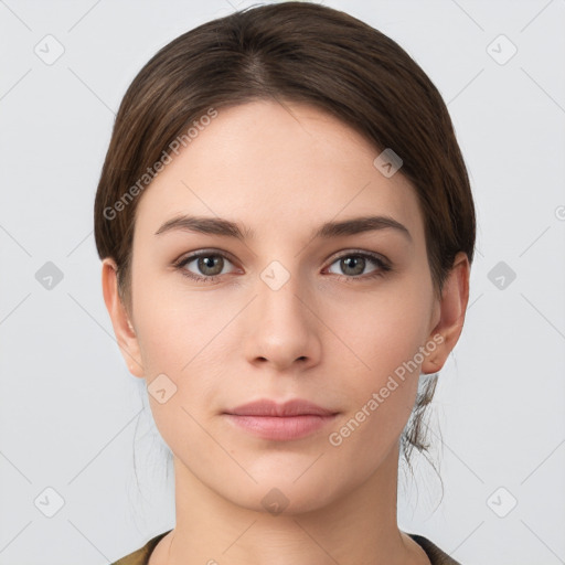 Neutral white young-adult female with short  brown hair and brown eyes