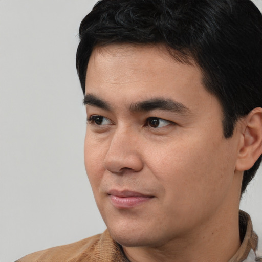 Neutral asian young-adult male with short  black hair and brown eyes