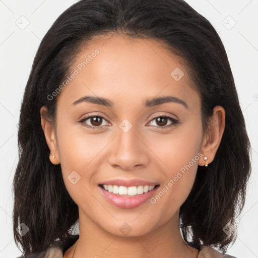 Joyful white young-adult female with long  brown hair and brown eyes