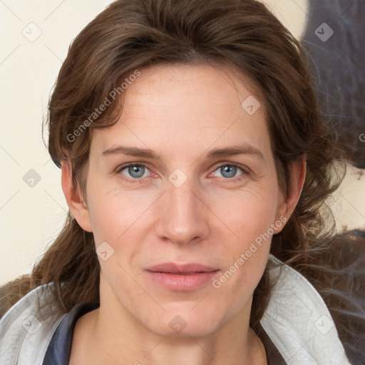 Joyful white young-adult female with medium  brown hair and blue eyes