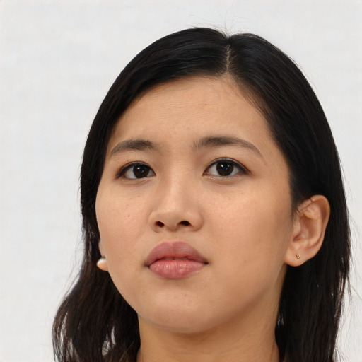 Neutral asian young-adult female with long  brown hair and brown eyes