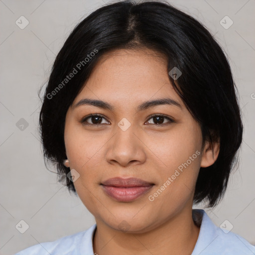 Joyful latino young-adult female with medium  black hair and brown eyes