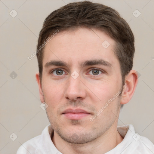 Neutral white young-adult male with short  brown hair and grey eyes