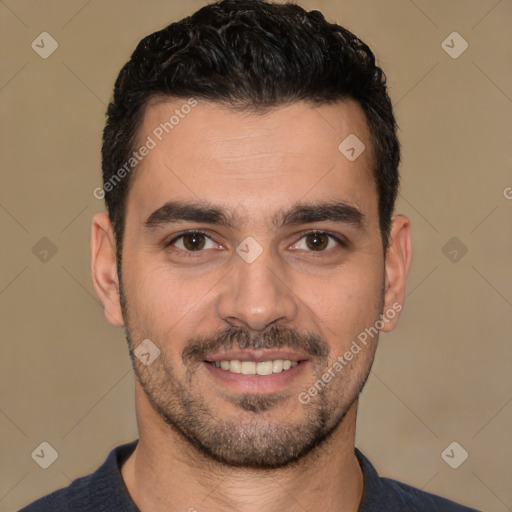 Joyful white young-adult male with short  black hair and brown eyes