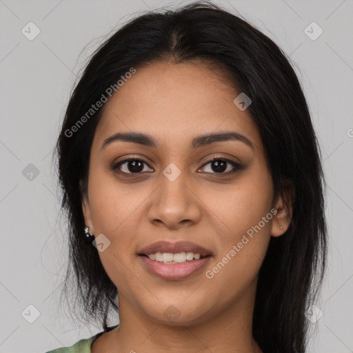 Joyful latino young-adult female with long  black hair and brown eyes