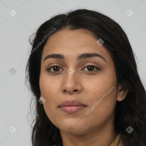 Joyful latino young-adult female with long  brown hair and brown eyes