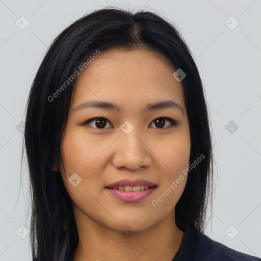 Joyful asian young-adult female with long  brown hair and brown eyes