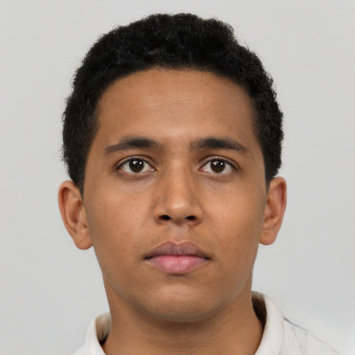 Neutral latino young-adult male with short  brown hair and brown eyes