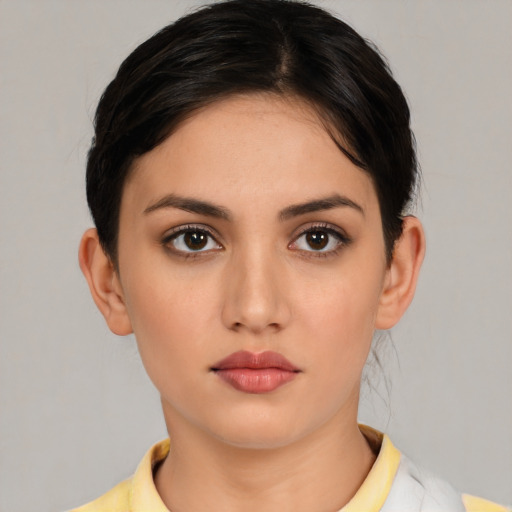 Neutral white young-adult female with medium  brown hair and brown eyes