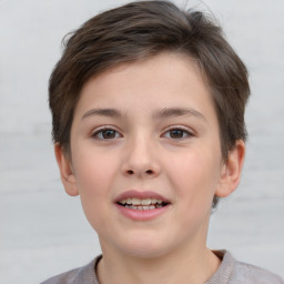 Joyful white child female with short  brown hair and brown eyes