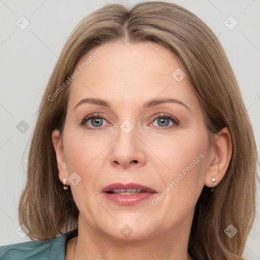 Joyful white adult female with medium  brown hair and grey eyes