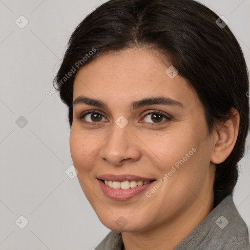 Joyful white young-adult female with medium  brown hair and brown eyes