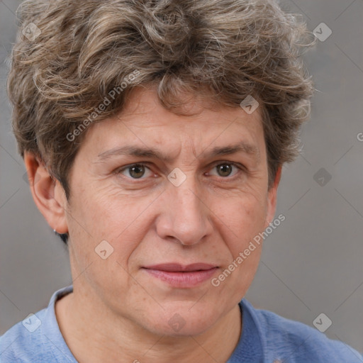 Joyful white adult male with short  brown hair and grey eyes